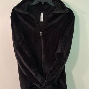 Super soft and brand new black zip up fleece jacket